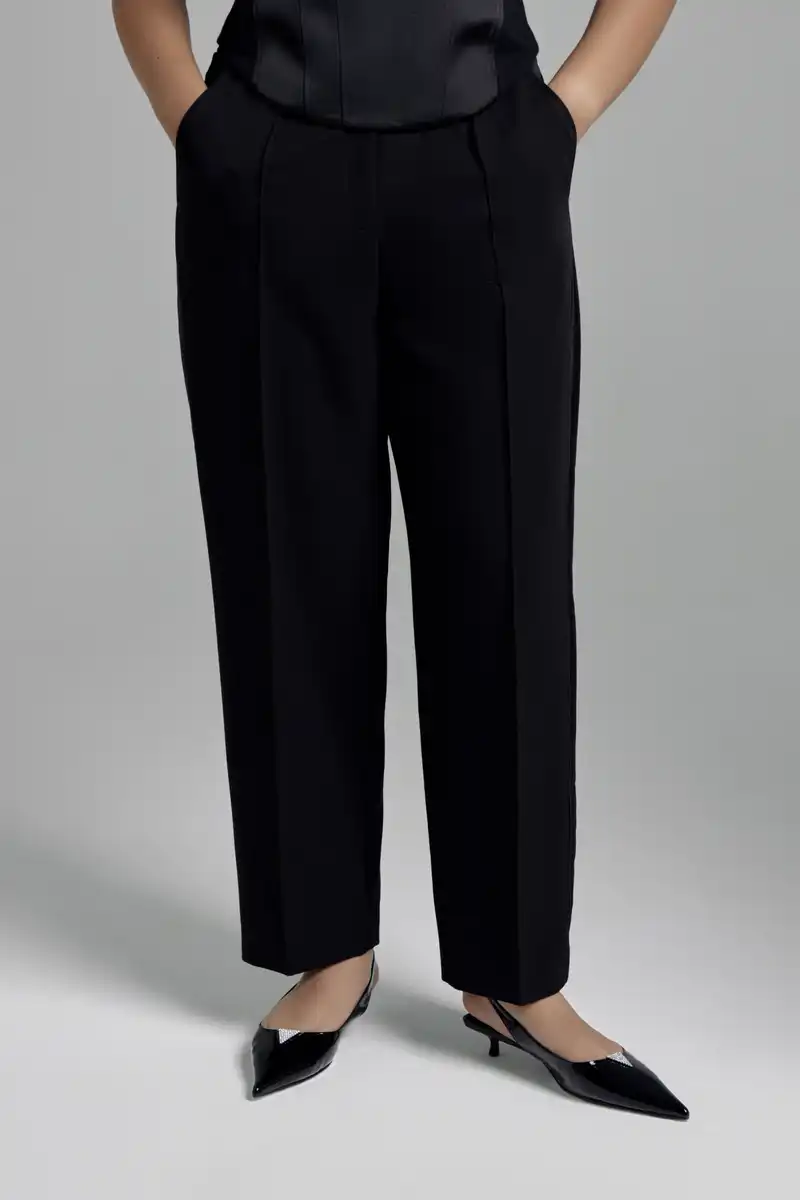 Брюки-бананы с атласной отделкой