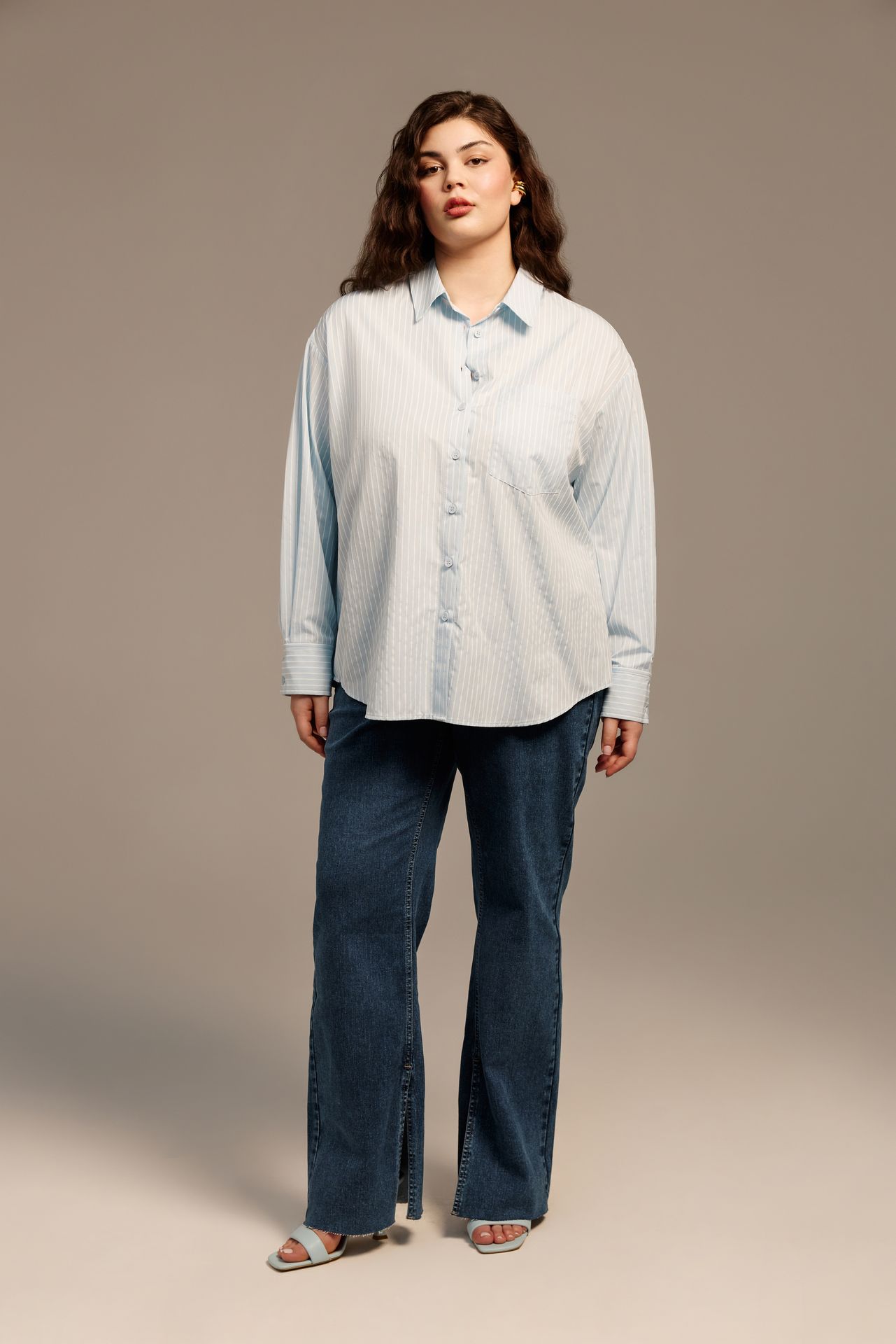 Джинсы с разрезами Боуи